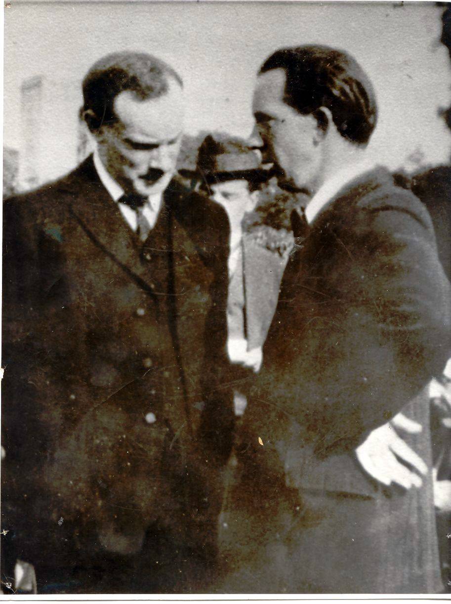 Patrick and William Pearse deep in conversation at a St Enda's event in 1914. The school was under considerable financial strain at this time. OPW.
